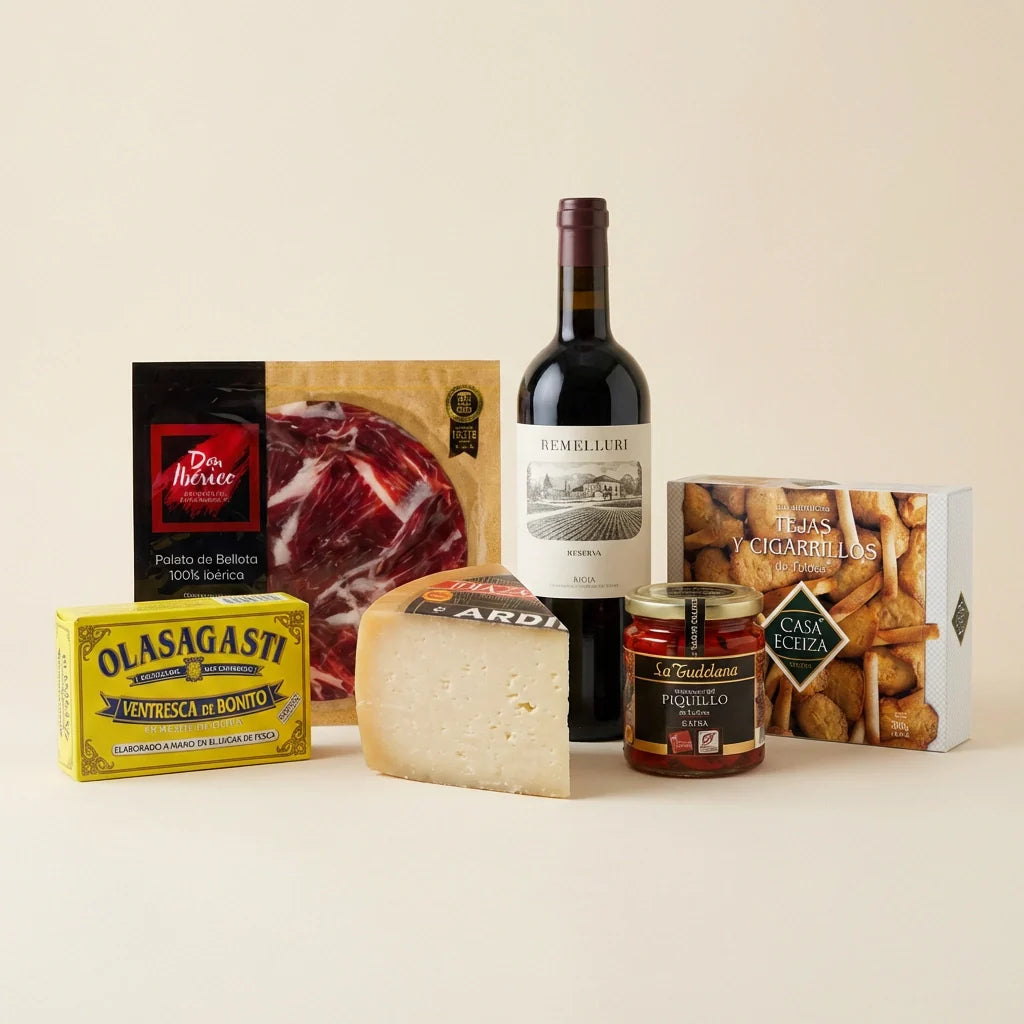 Cesta gourmet con jamón ibérico, queso Idiazabal y vino Rioja